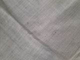 a close up of a piece of fabric with a hole in it