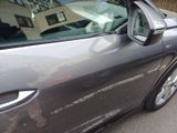 a car that is parked on the side of the street