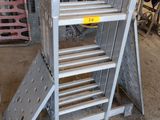 a metal ladder that is sitting in a garage