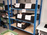 many bins and boxes of food in a room