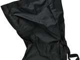 the large black bag is sitting on top of a white surface