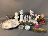 a lot of figurines that are sitting on a table