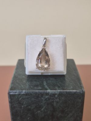 sterling silver ring with a pear shaped citrine stone