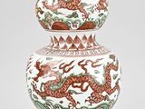 an image of a vase with a dragon on it on a stand