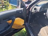 a car that has a steering wheel and a seat in it