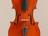 an old violin with a bow on a white background