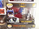 two batman and robin action figures in the box