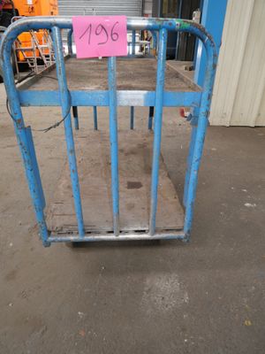 a blue gate with a sign on it that says 766