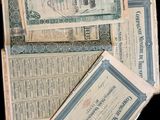 a pile of old money sitting on top of each other