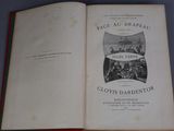 an open book with a picture of a group of people on it