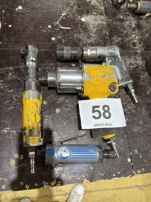 a lot of tools that are laying out on the floor