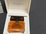 an image of a bottle of perfume in a box
