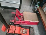 a red jack that is sitting on the ground