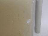a candle that is sitting on a white table