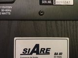 a close up of a power subwoofer with a label on it