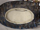 a picture of a blue and white bowl on a table