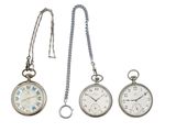 three different types of pocket watches on a chain on a white background