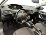 the interior of a small car with a steering wheel and dashboard