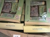 two boxes of soaps sitting on top of a cardboard box