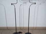 two lamps that are on the floor next to each other