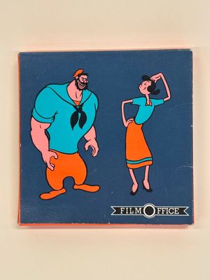 aimant à l'effigie d'un homme et d'une femme en costume-cravate