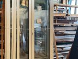 many different types of doors and windows in this warehouse