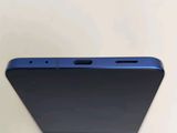 a close up of the back of a cell phone on a table