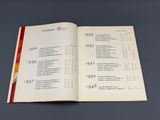 an open book on a table with a number of numbers on it