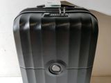 an image of a piece of luggage sitting on a table