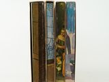three books that are stacked on top of each other