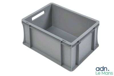 a close up of a gray plastic crate on a white background