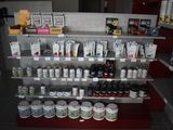many different types of products on the shelves in the store