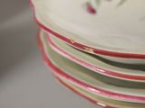 several plates stacked on top of each other on a table