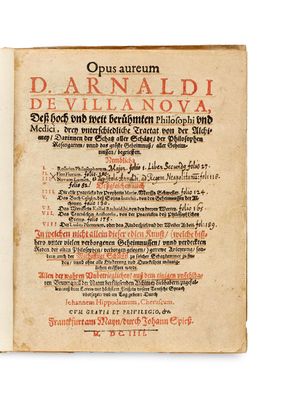 un vieux livre dont le titre est écrit en noir et rouge
