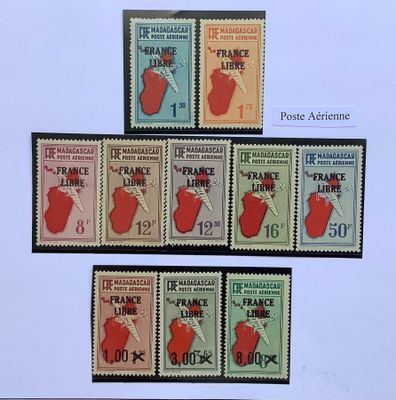 four different stamps of different colors and sizes on a white background