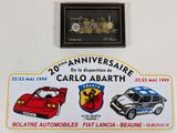a picture of a sign with a picture of a car and a train
