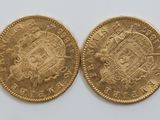 two gold sovereigns, one of which is a sovereign and the other of which is a sovereign