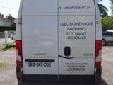 a white van that is parked in a parking lot