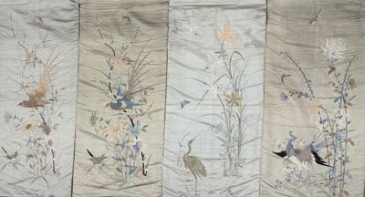 four panels of fabric with birds and flowers on them
