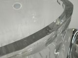 a clear glass bowl sitting on top of a counter