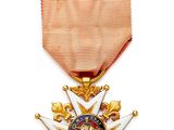 gros plan d'une médaille sur fond blanc
