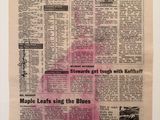 newspaper article about maple leaves being sold by the blues