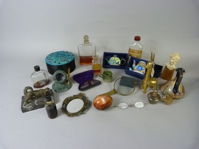 many different types of perfume bottles on the table