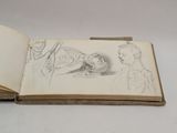 an open book with a drawing of a man and a woman on it