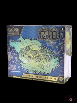 a close up of a box of pokemon trading cards on a black background