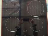 a picture of a picture of a stove top with four burners