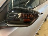 an image of a side view mirror of a car