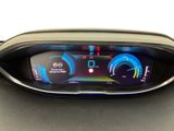 the dashboard of a car with a digital display in the center