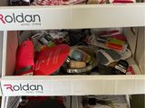 two shelves that have various items in them
