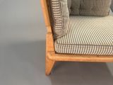 an image of a chair with a cushion on it